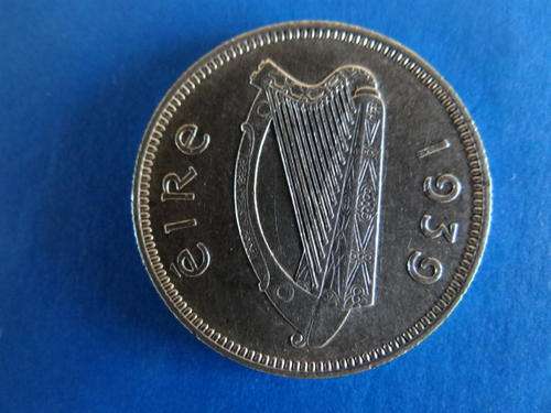 A LOVELY 1939 UNCIRCULATED SILVER SHILLING FROM IRELAND.